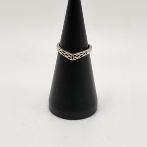 Beautiful sterling silver vintage shaped open work ring.  Size 7.